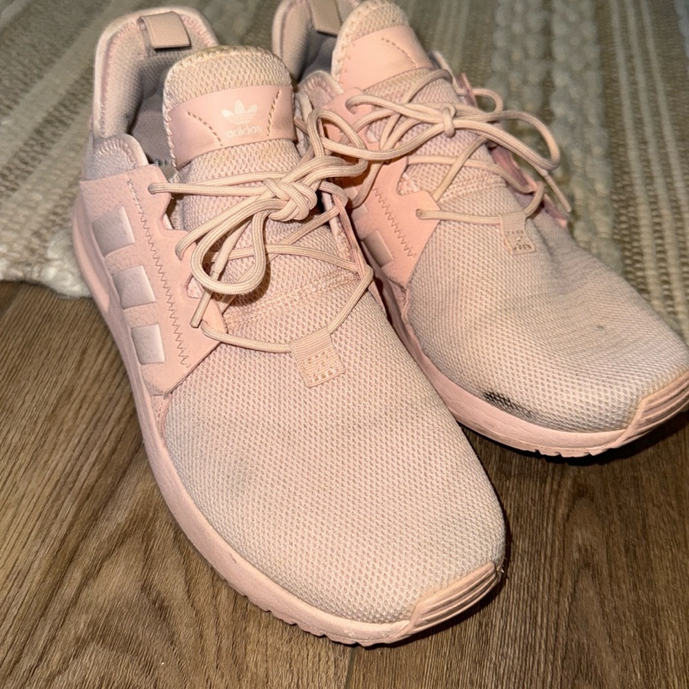 Pink Adidas running shoes